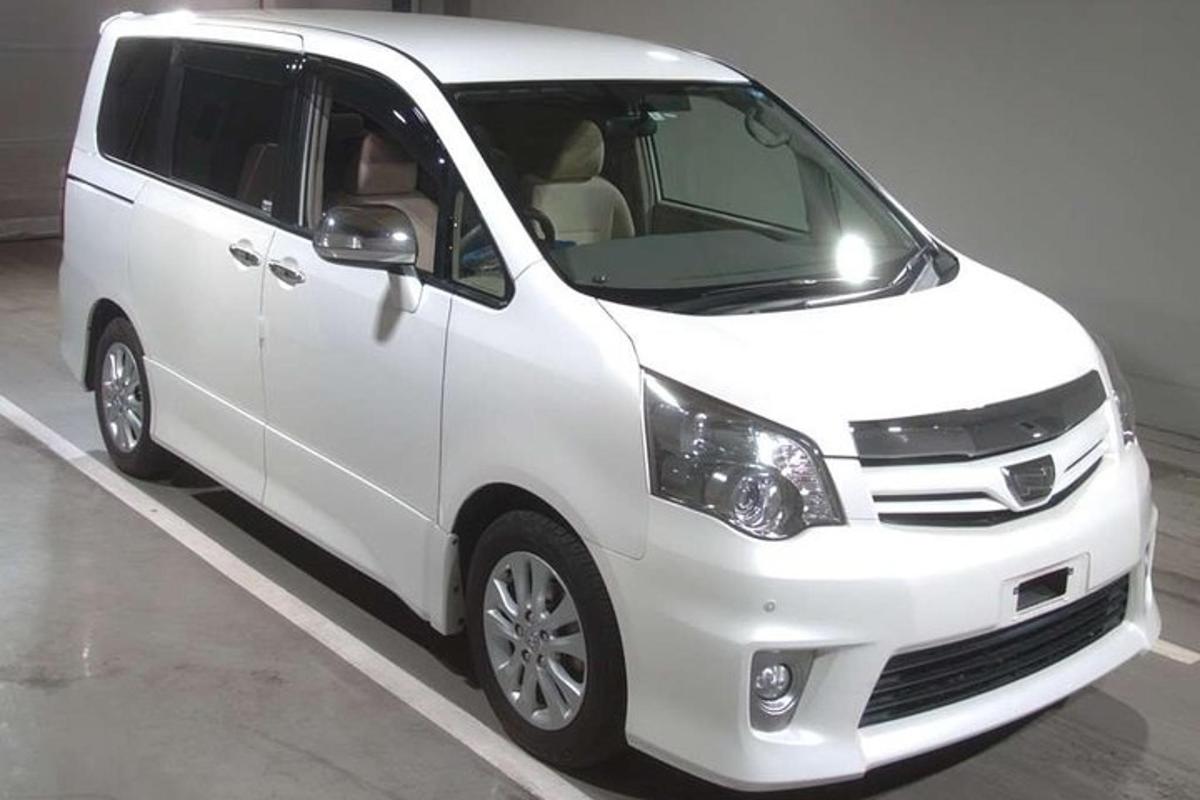 a white van parked in a parking lot