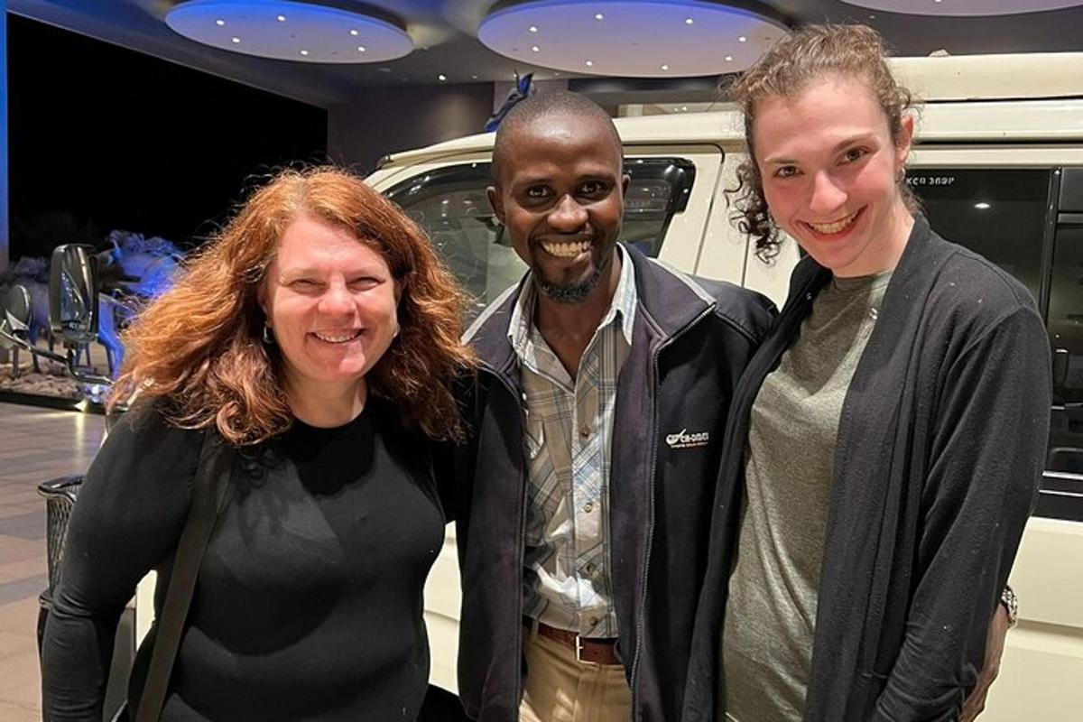 a man and two women posing for a picture