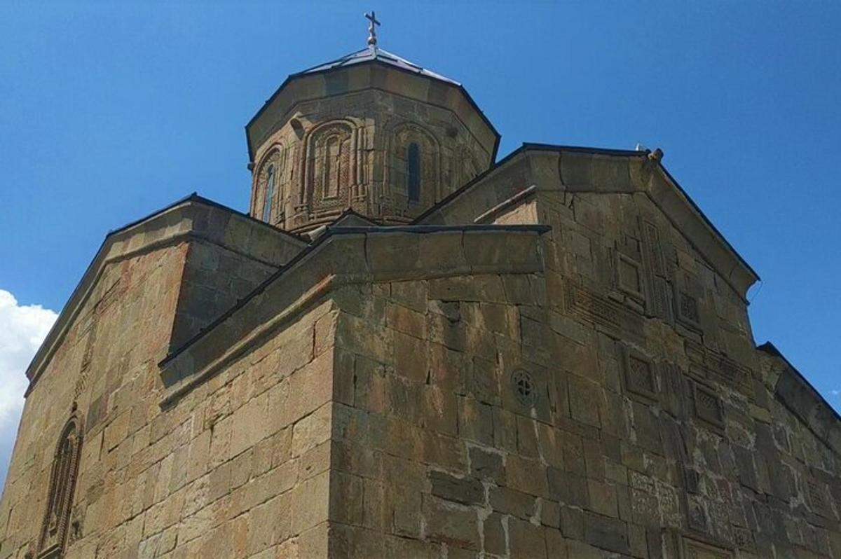 a brick building with a tower on top of it