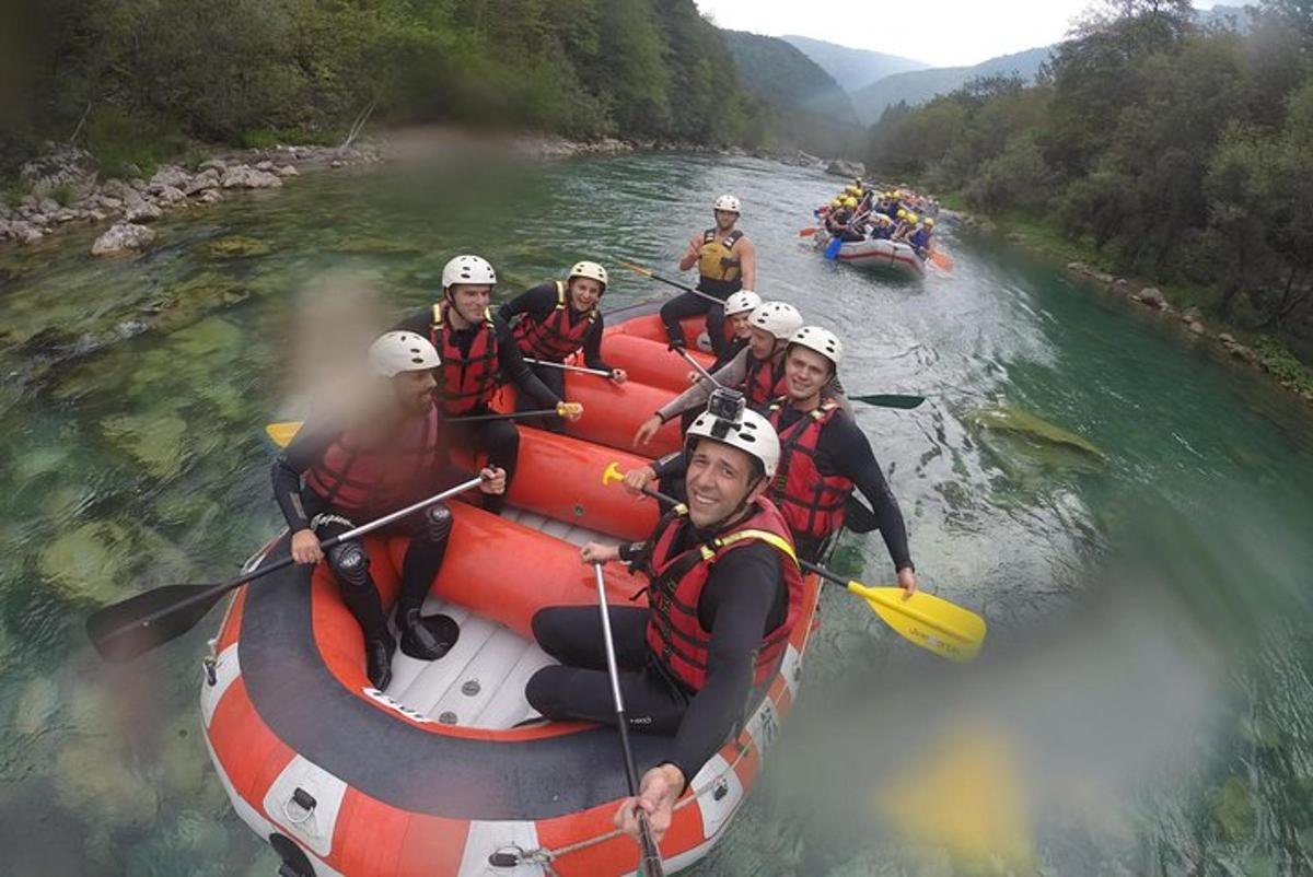 a group of people are rafting on a river