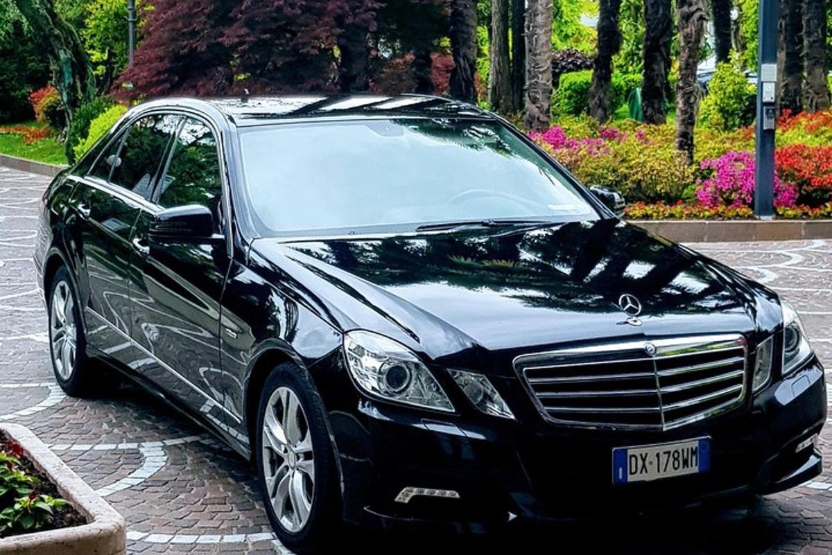 a black car parked in a parking lot