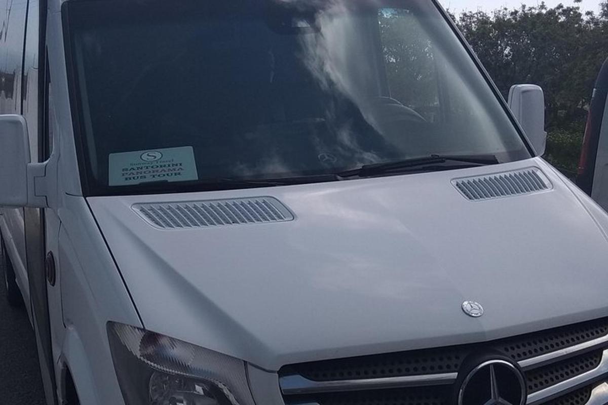 a close up of the front of a white van
