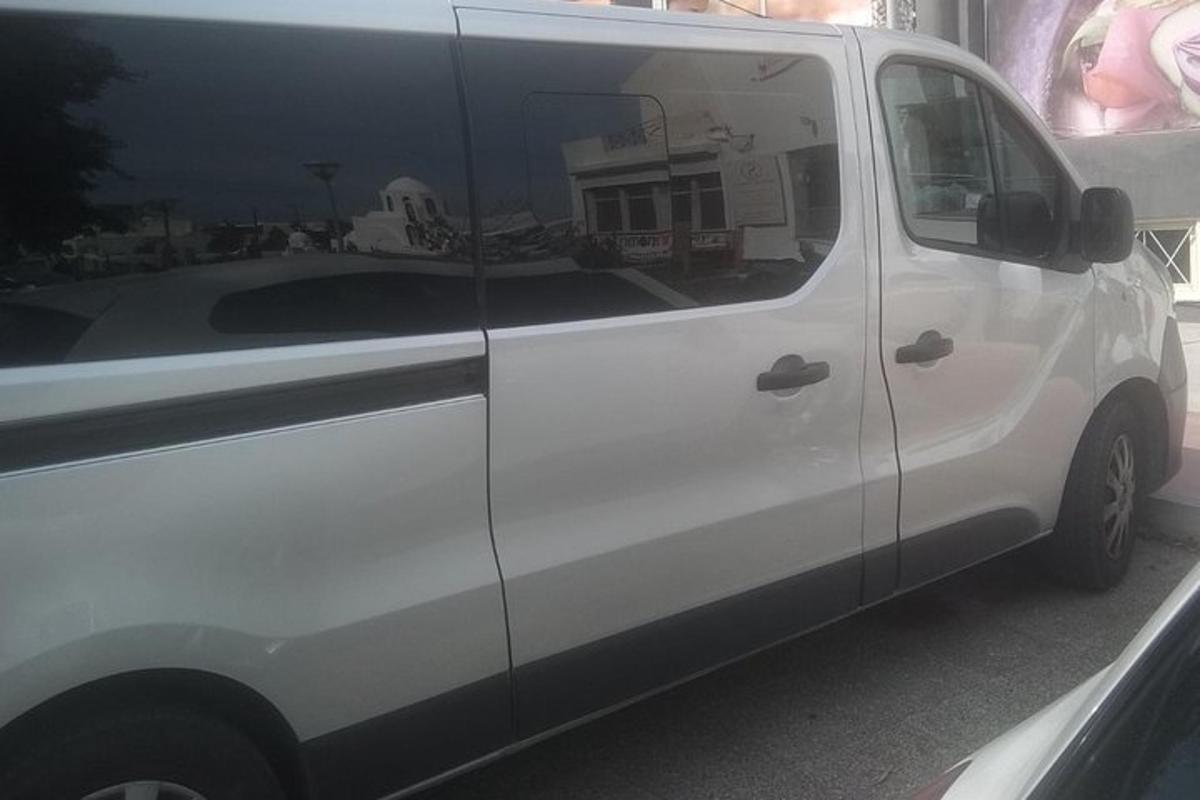 a white van parked in a parking lot