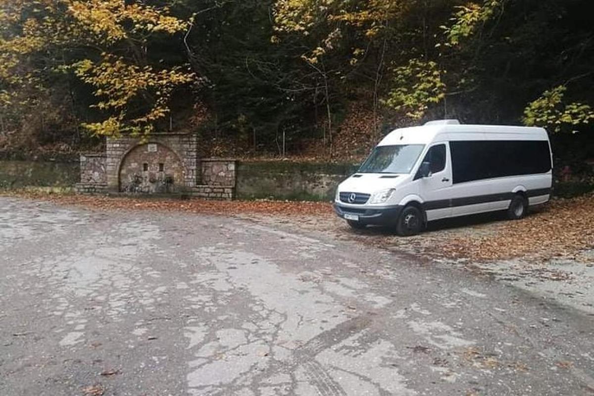 a white van parked on the side of a road