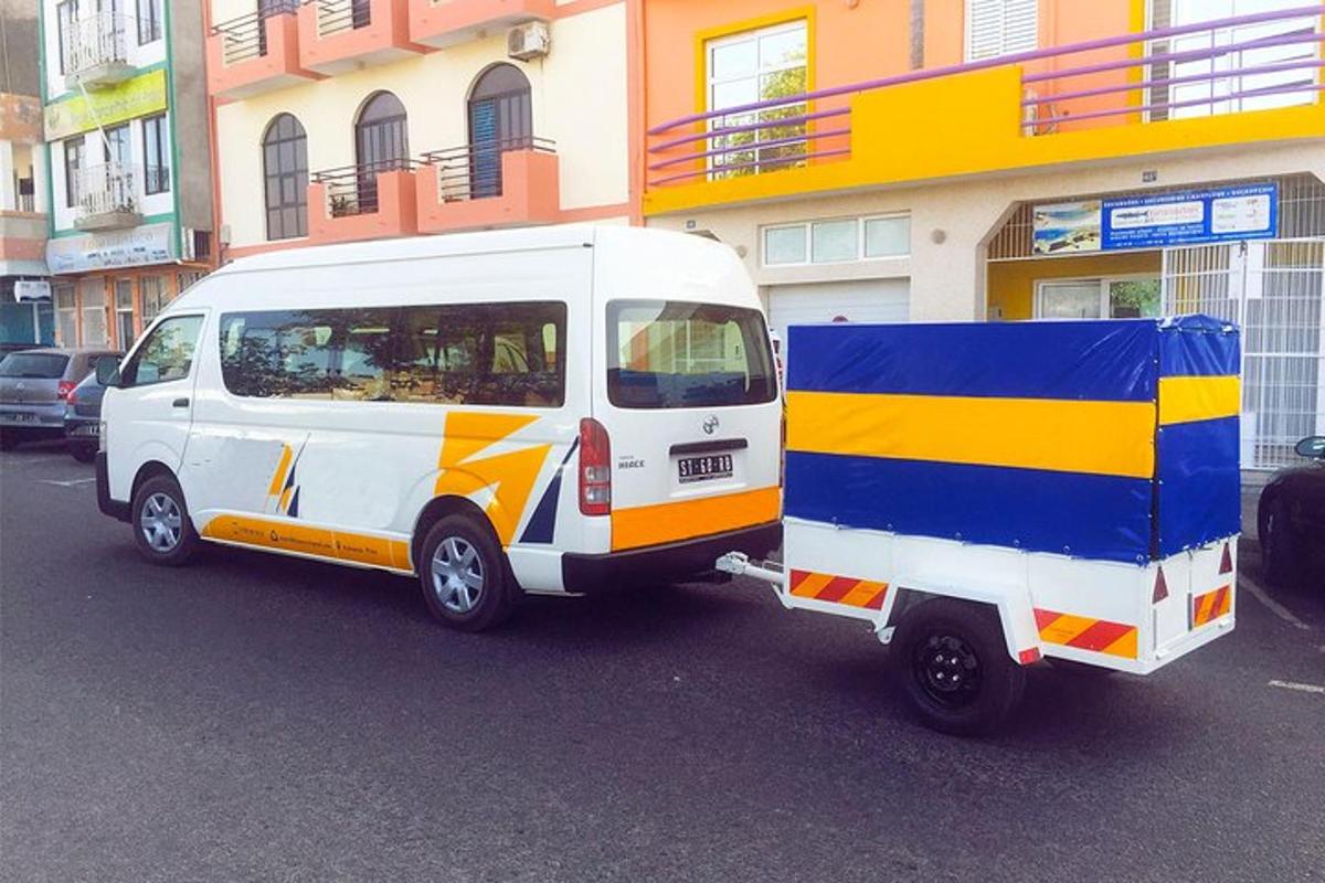 a small van parked on the side of a street