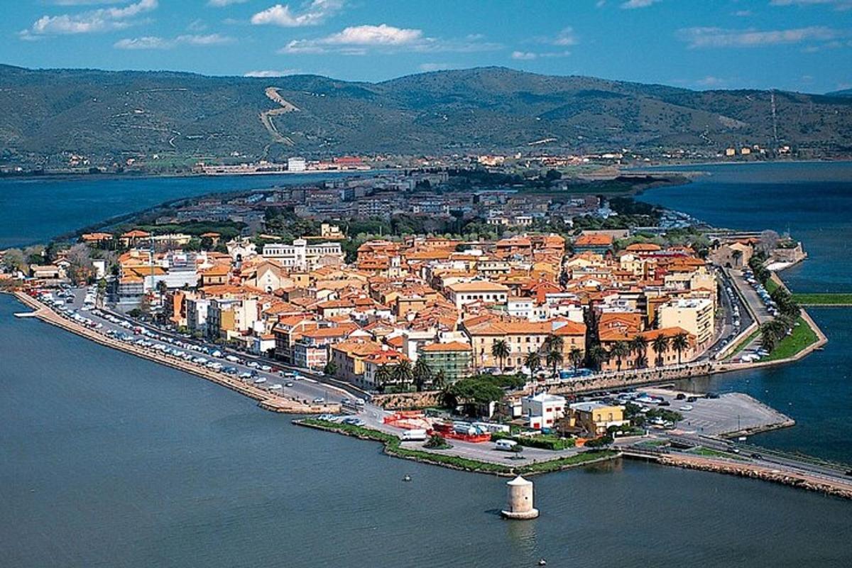 an aerial view of a town on the water