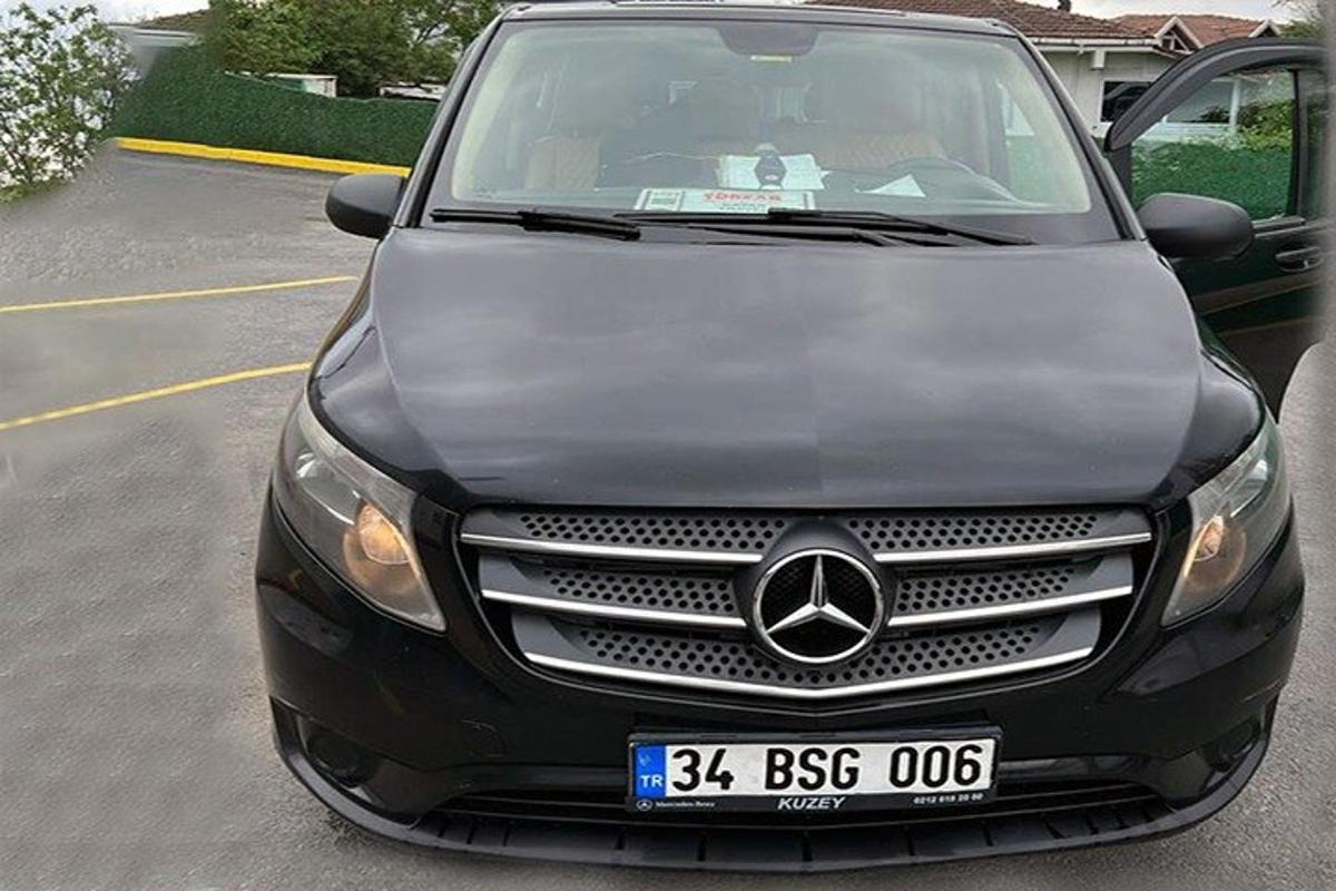 a mercedes benz car parked in a parking lot