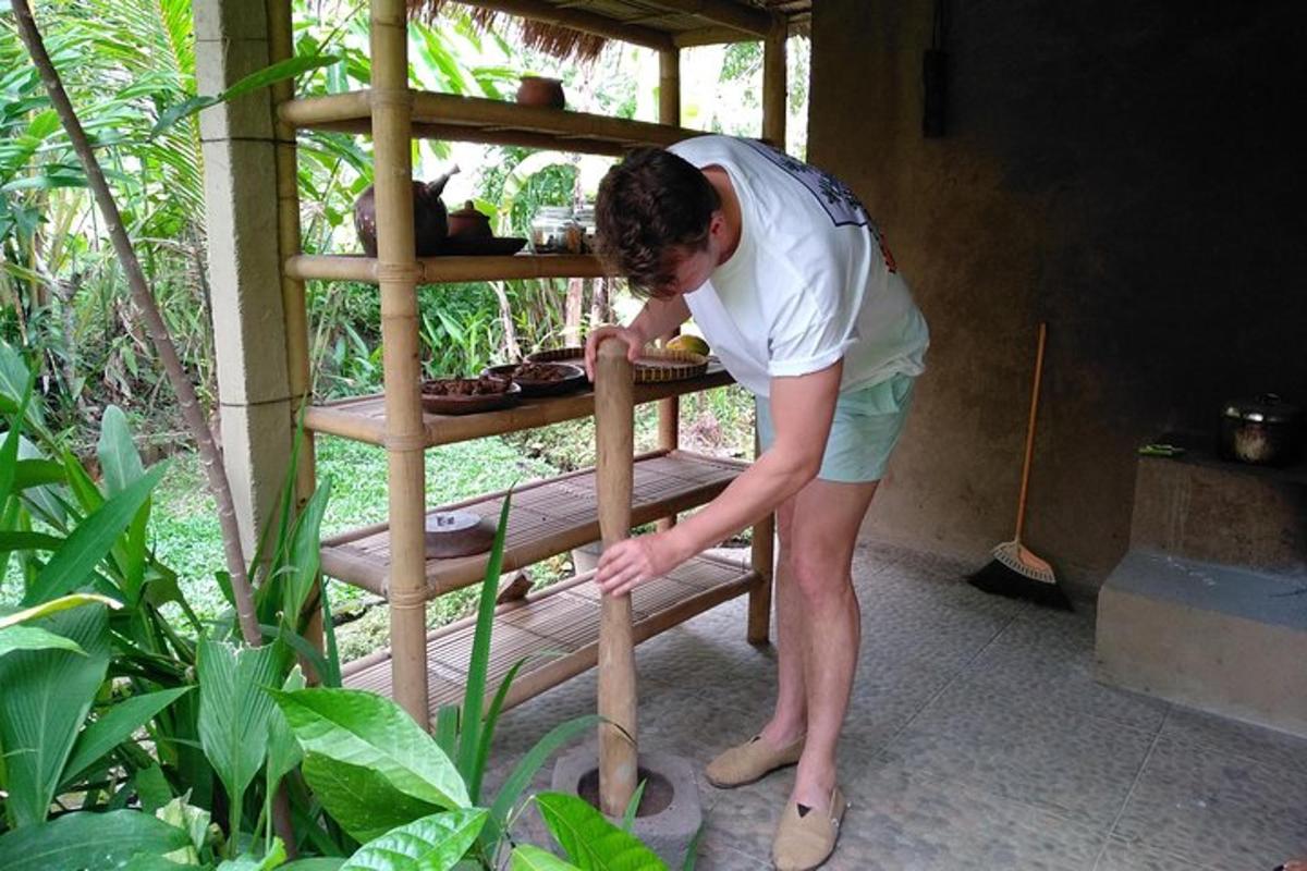 a man bending over to look at a wooden stand