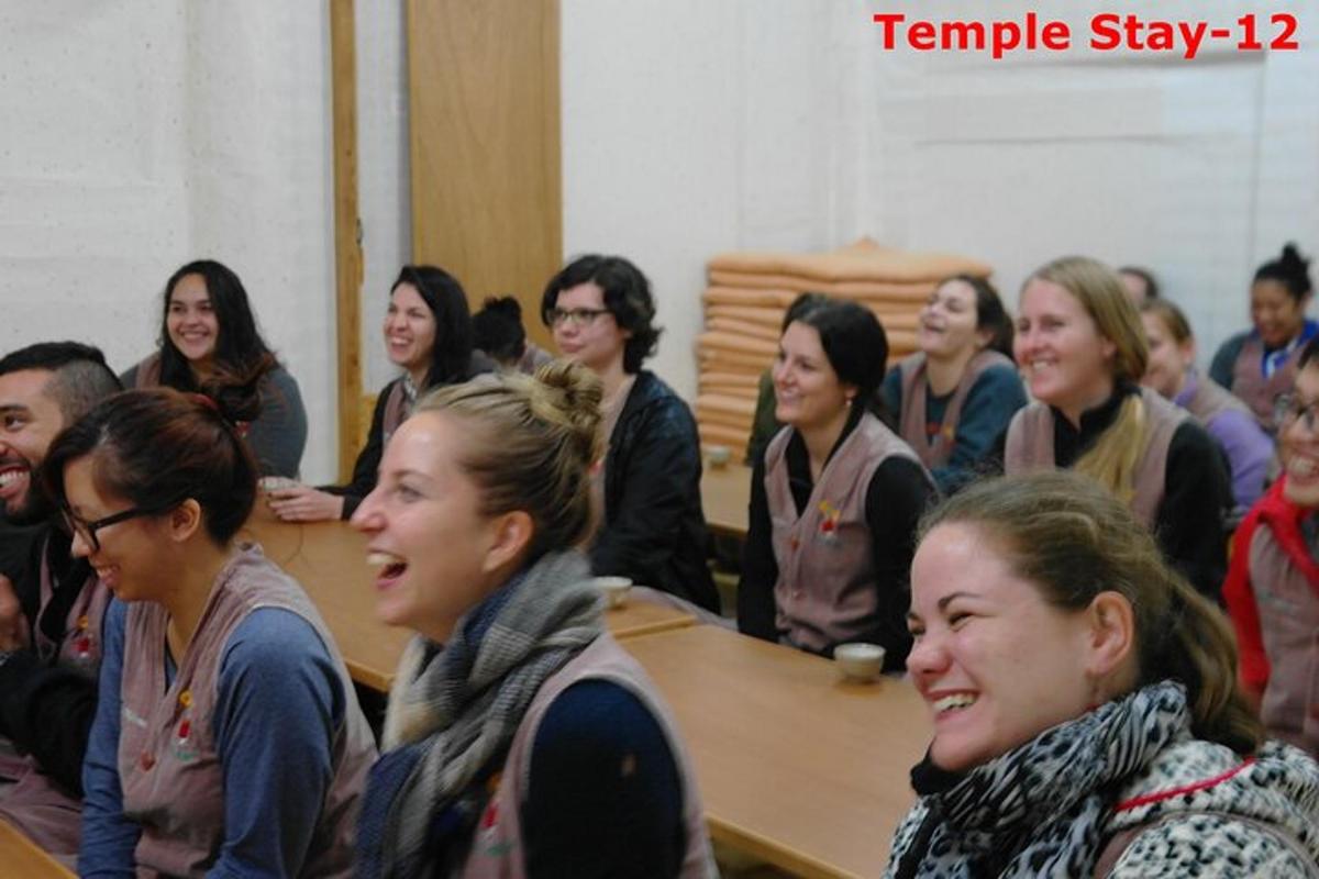 a group of people sitting at tables in a room