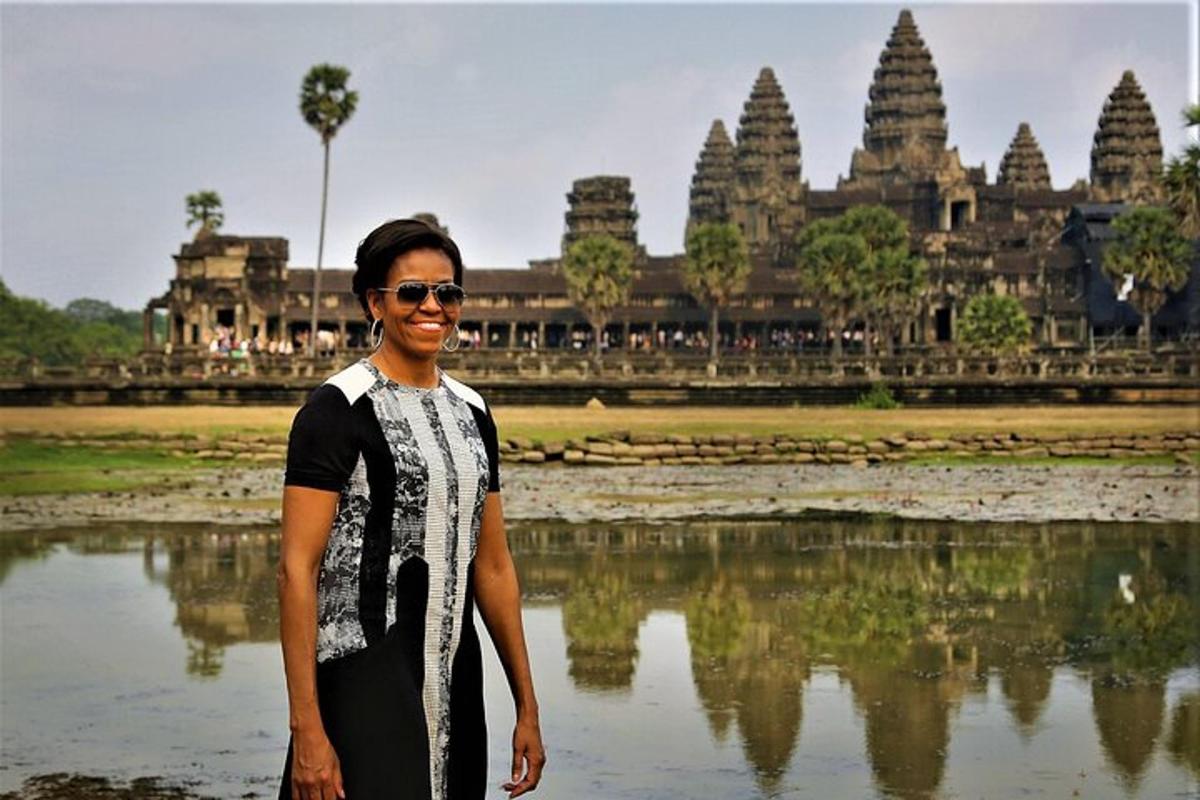 a man standing in front of a temple