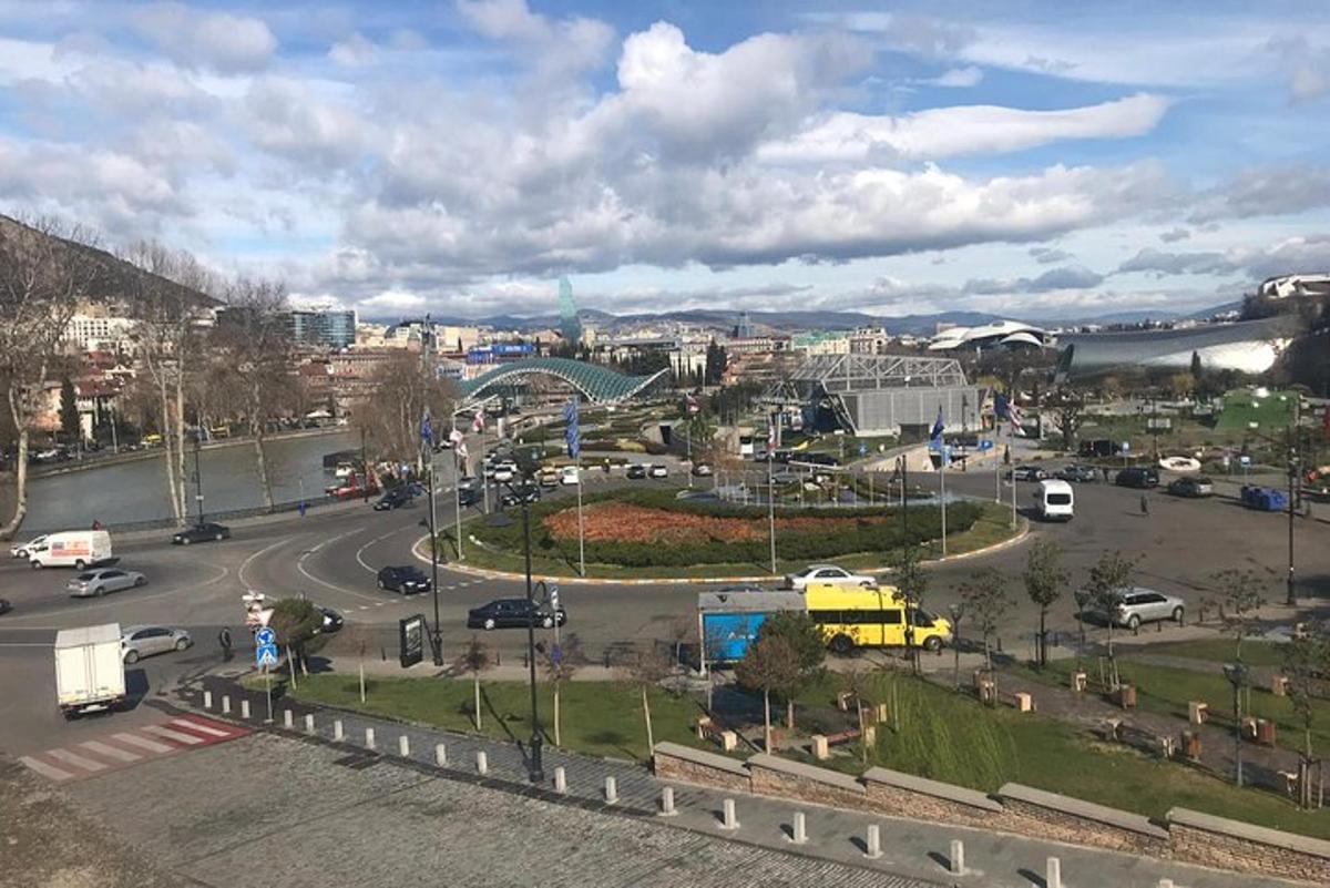 a view of a city with a street with cars
