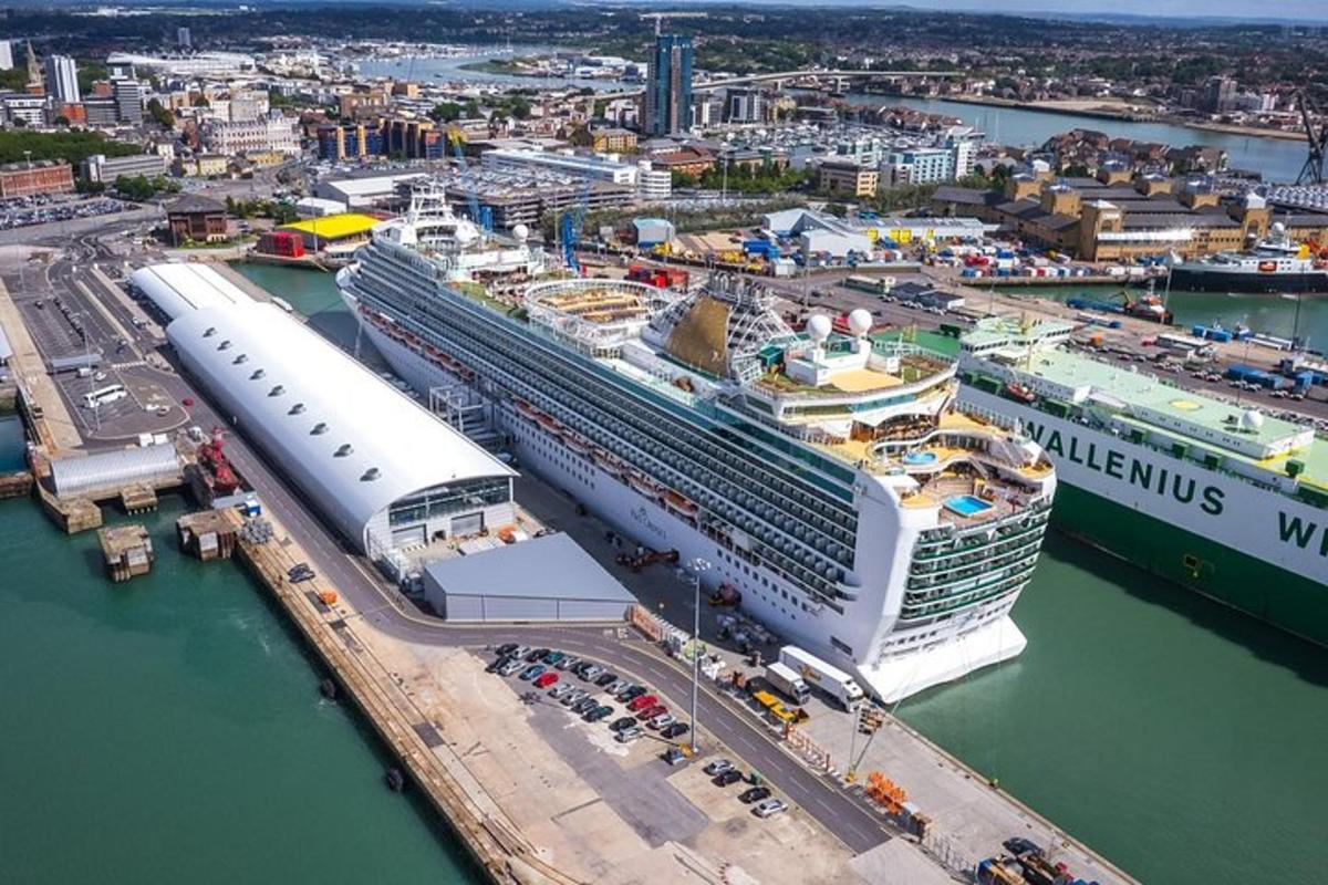 an overhead view of a cruise ship docked in a harbor