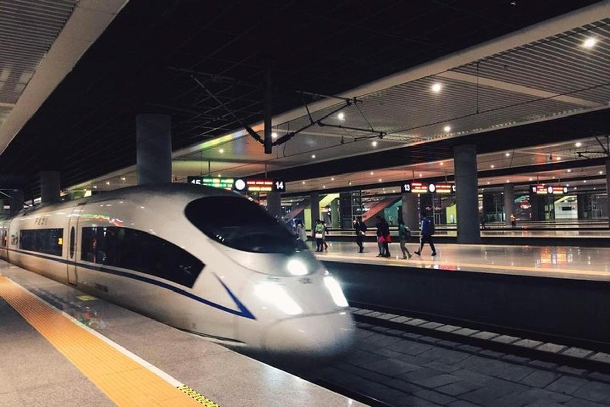 a train is on the tracks at a train station