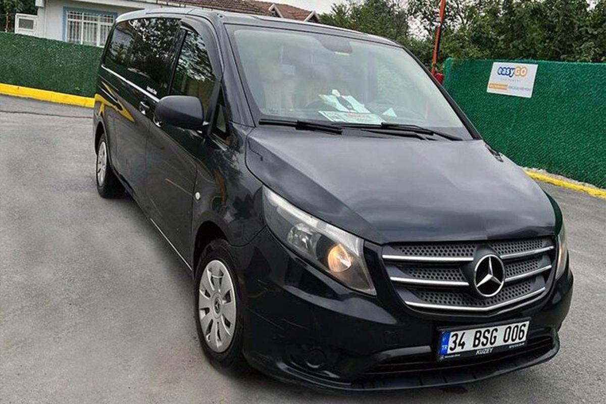 a black car parked in a parking lot