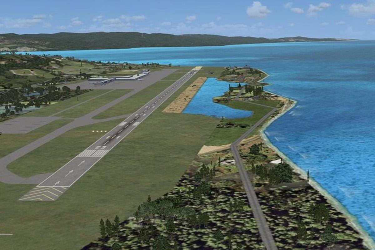 una vista aerea di una pista di aeroporto nell'oceano