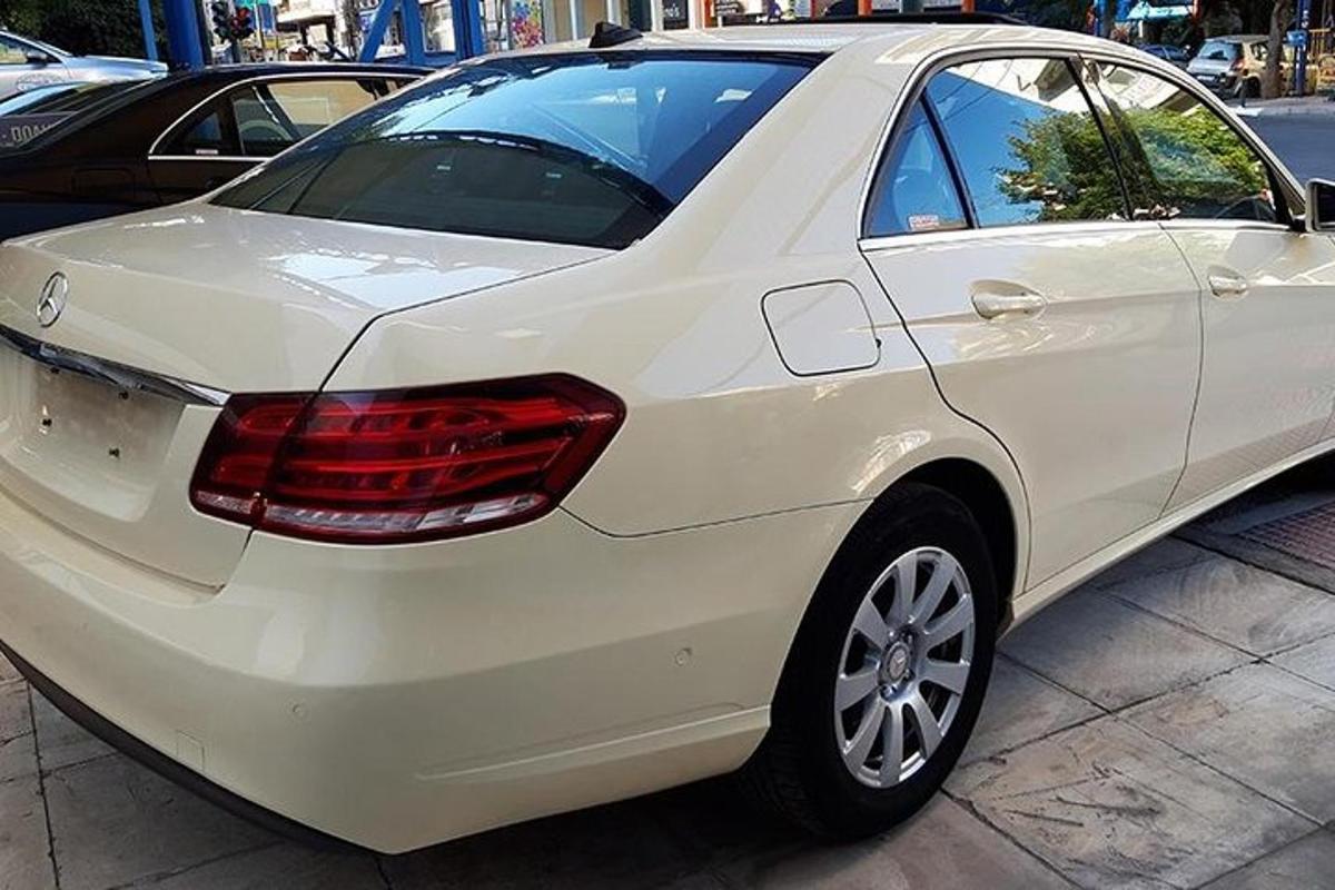 a white car parked in a parking lot
