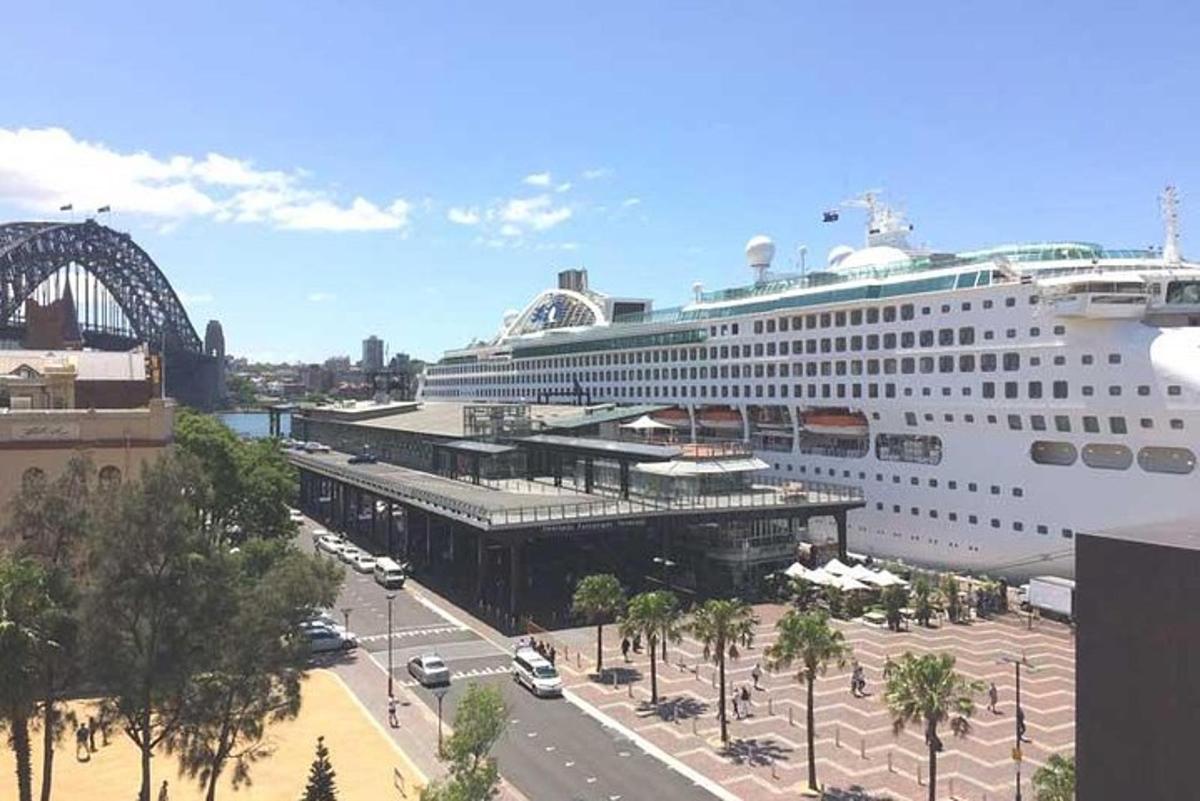 a cruise ship is docked in a city