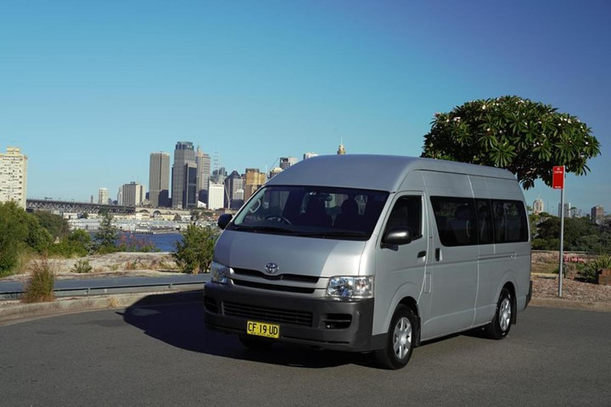 a white van is parked in a parking lot