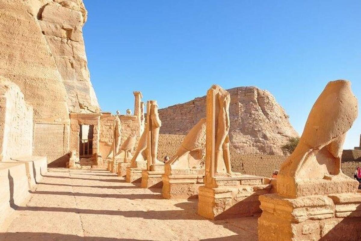 a group of statues in the desert