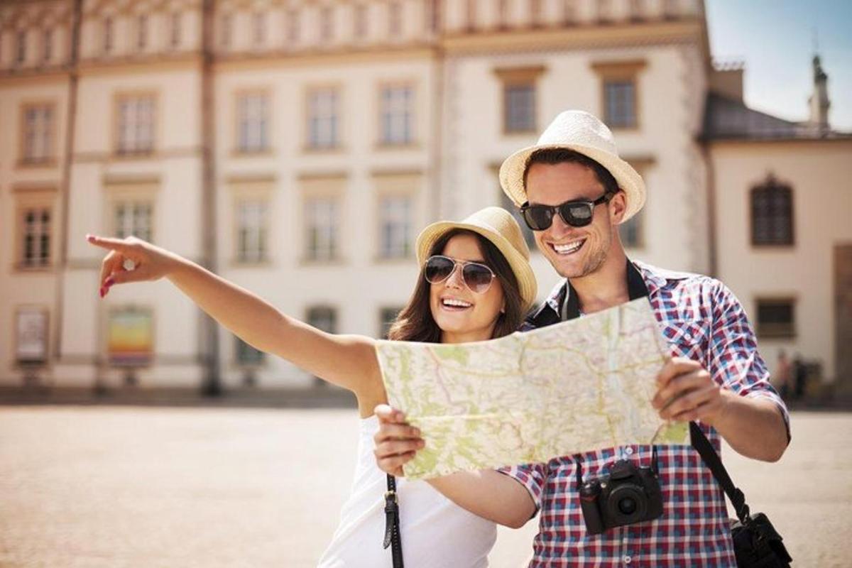 a man and a woman looking at a map