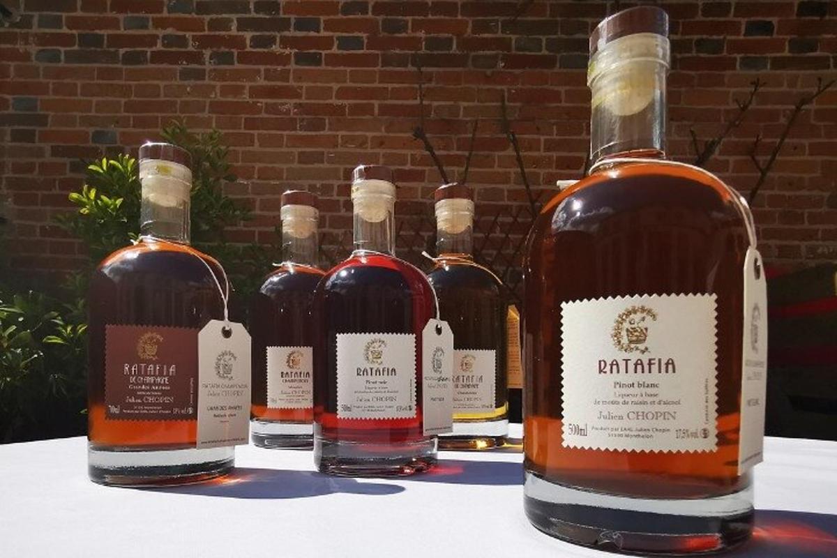 a group of bottles of wine sitting on a table