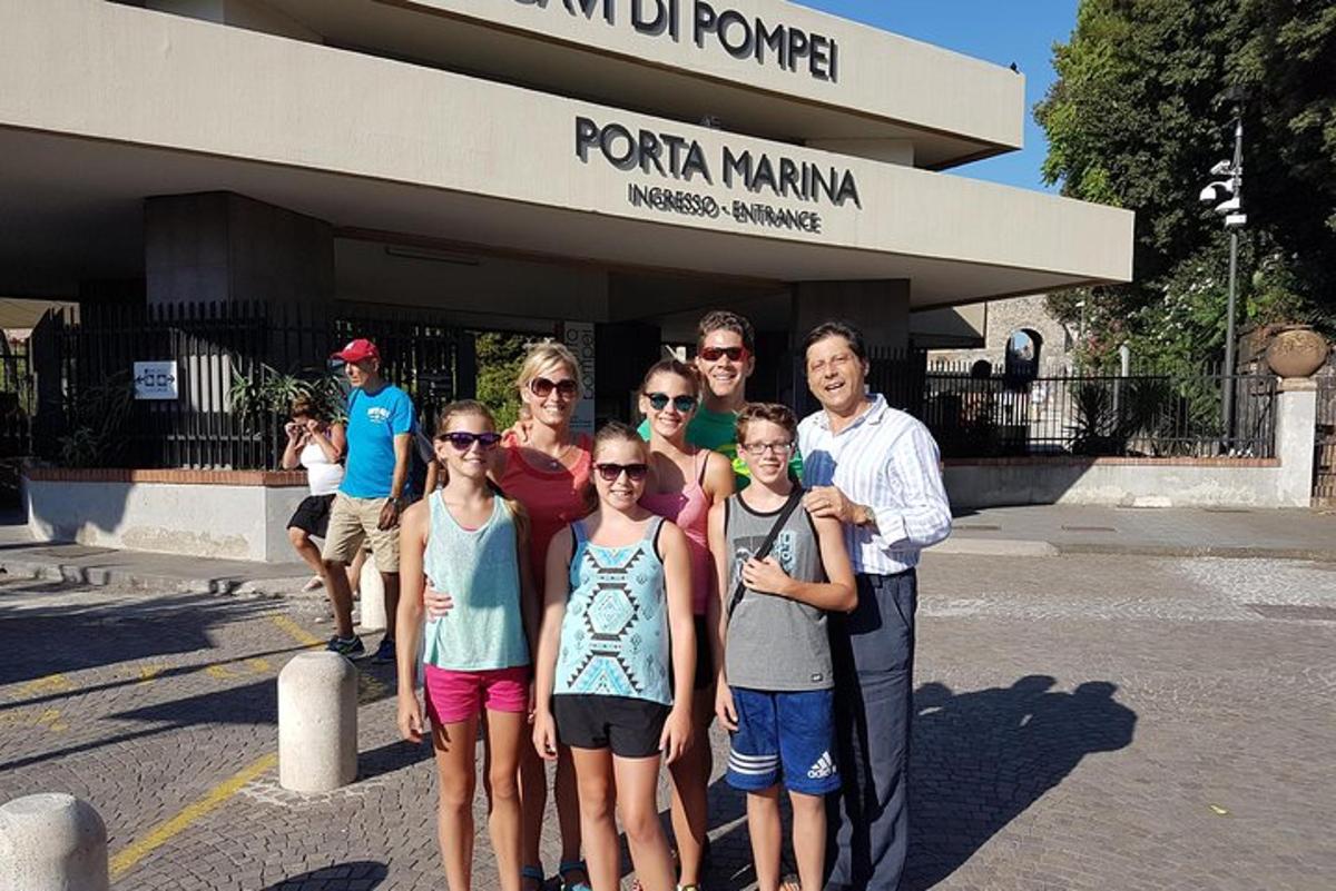 a group of people standing in front of a building