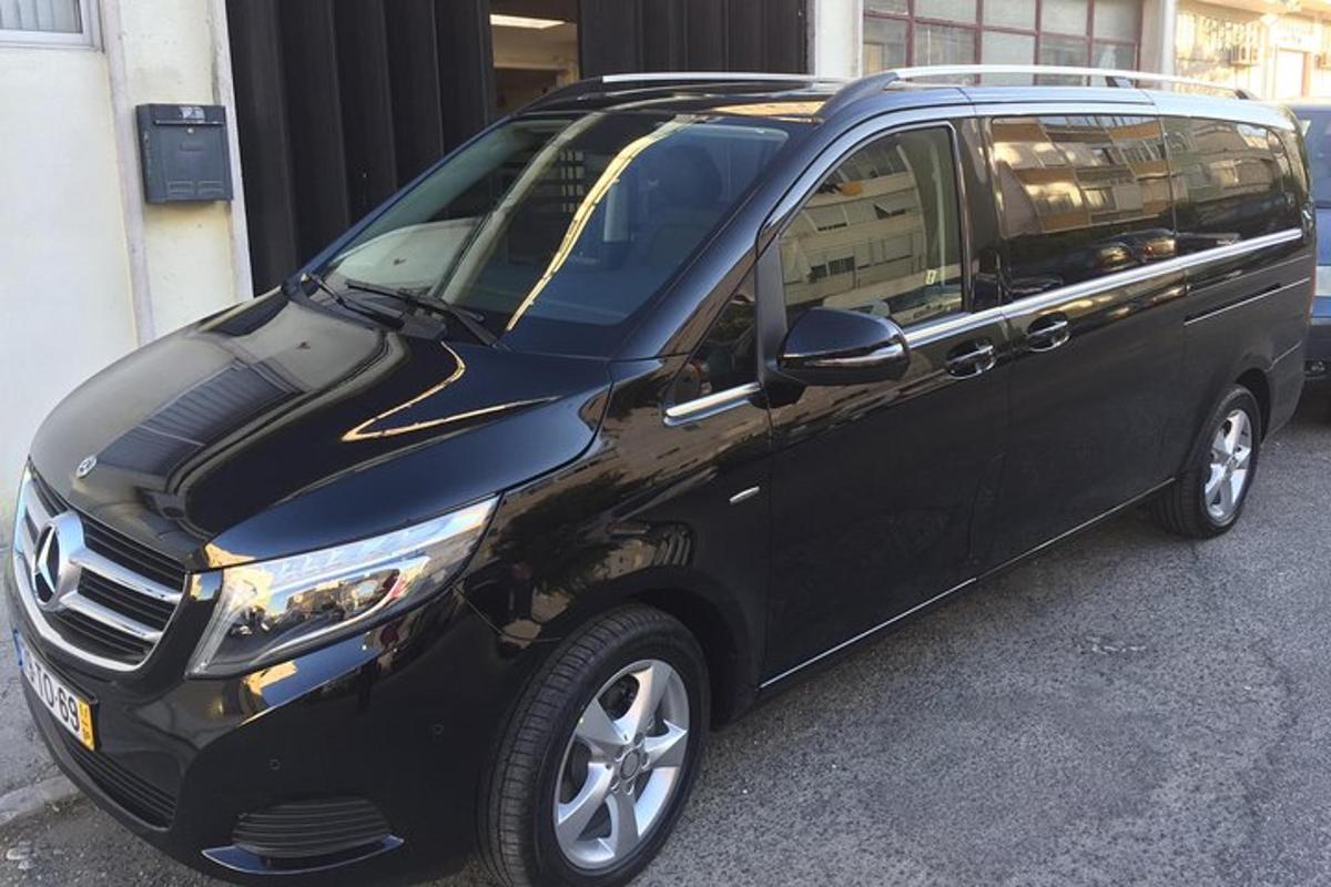 a black van parked in a parking lot