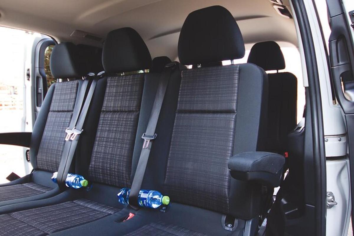 a van with empty seats in the back
