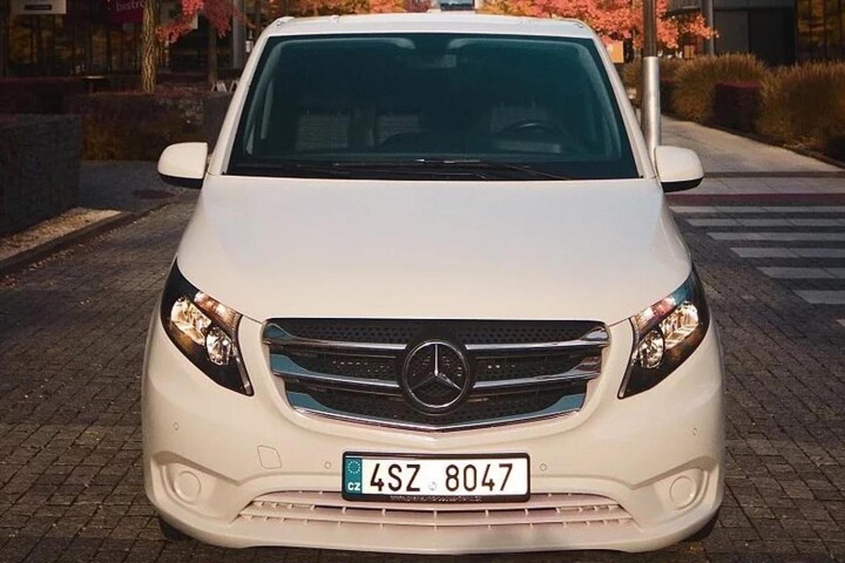 a white car parked in a parking lot