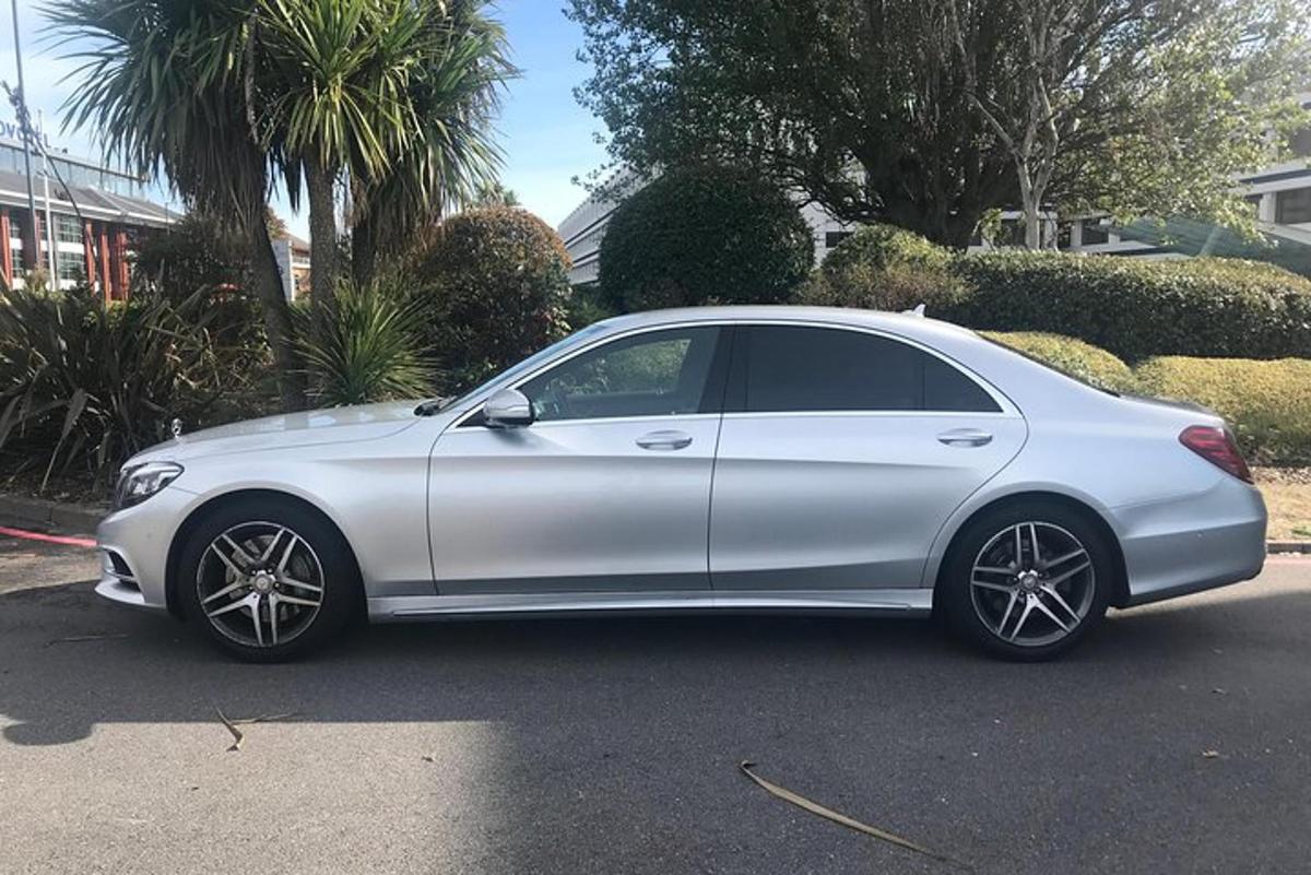 a white car parked in a parking lot