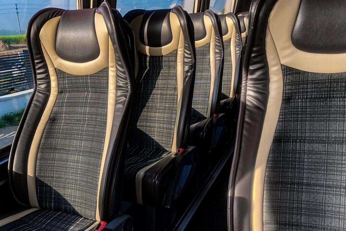 two rows of empty seats on a bus