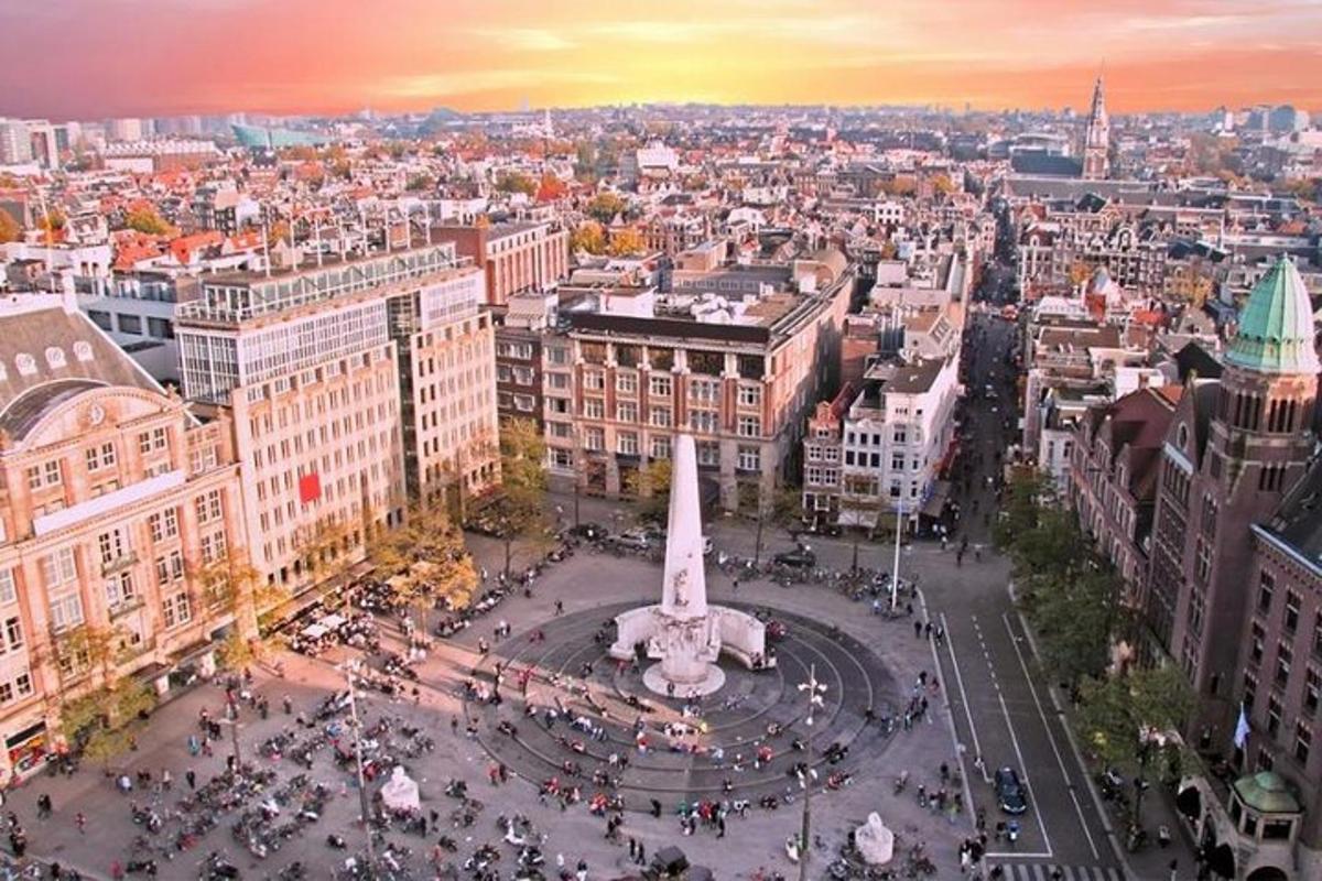 an aerial view of a city with a monument