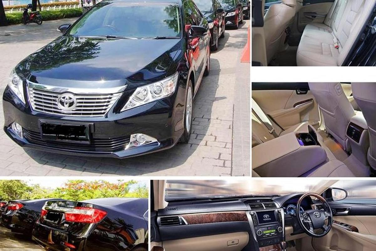 red automobila parkiranih na parkiralištu