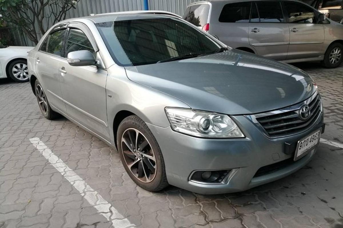 a silver car parked in a parking lot
