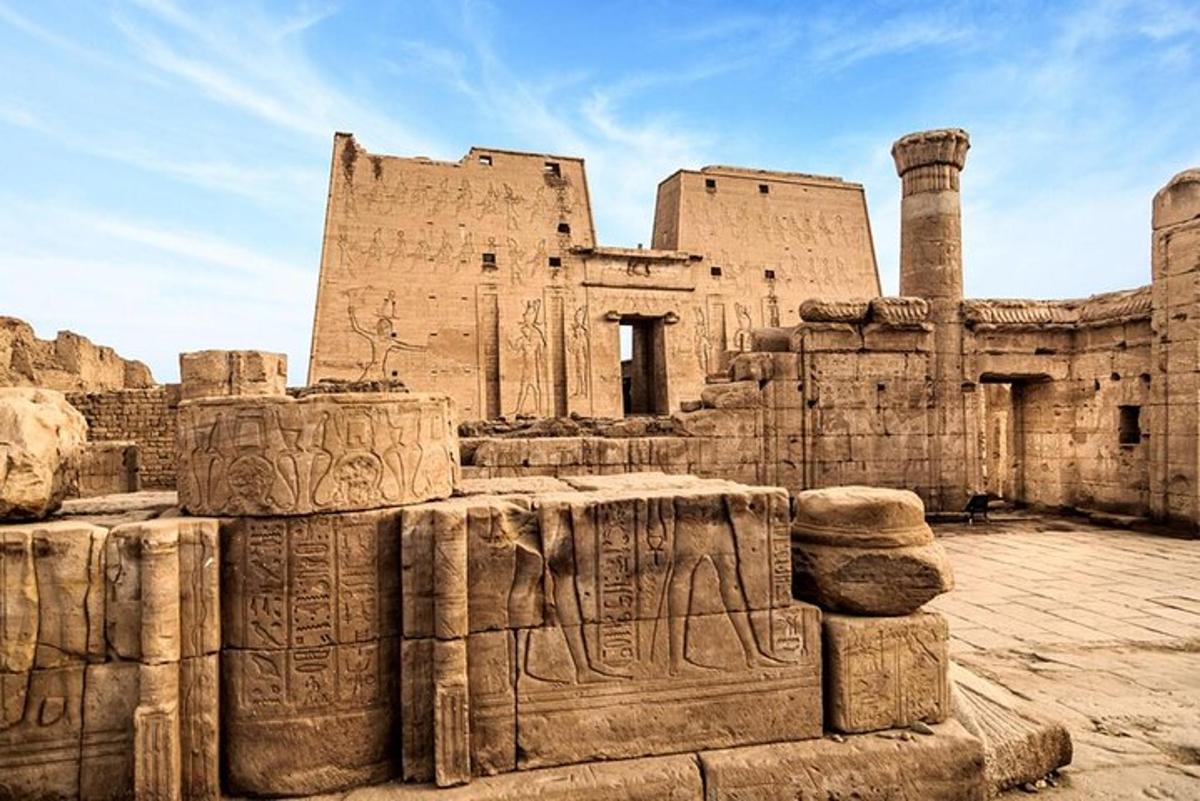 an ancient building with relief on the side of it
