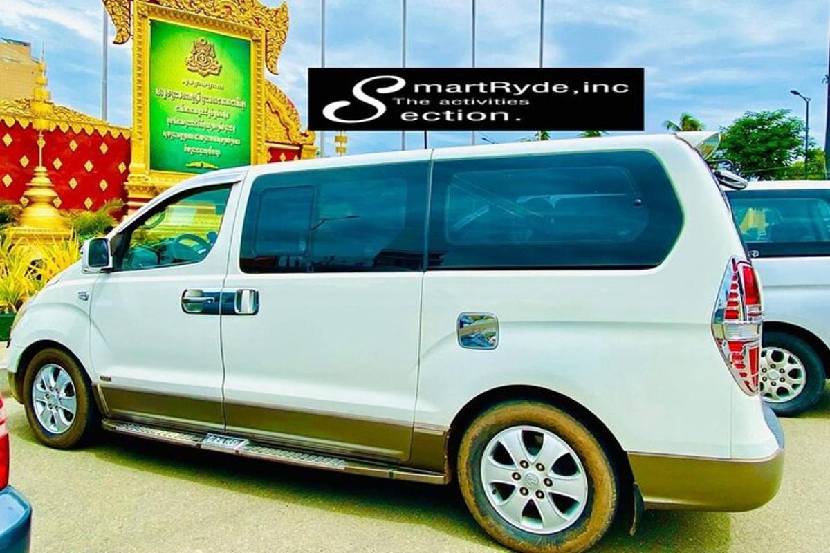 a white van parked in front of a store