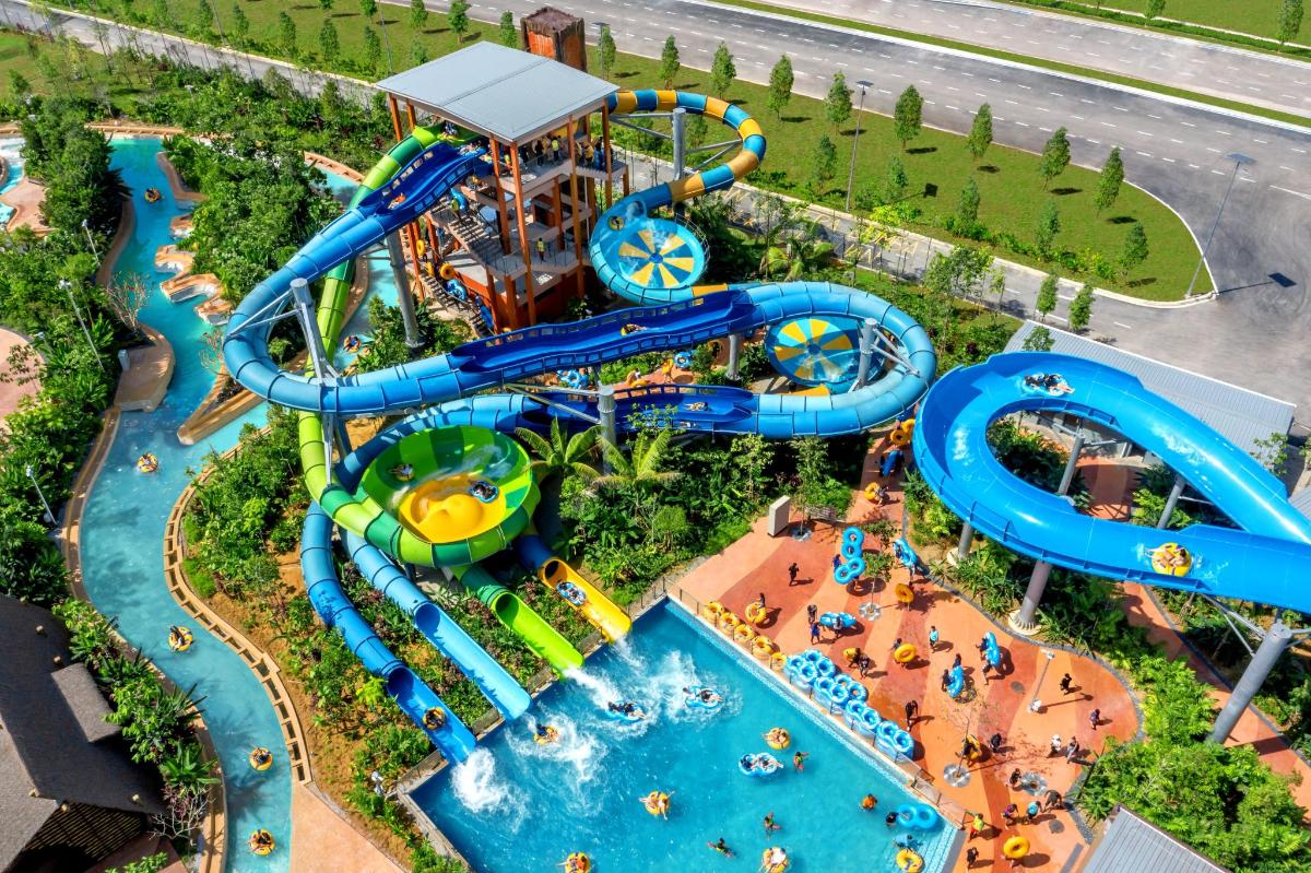an aerial view of a water park with a water slide