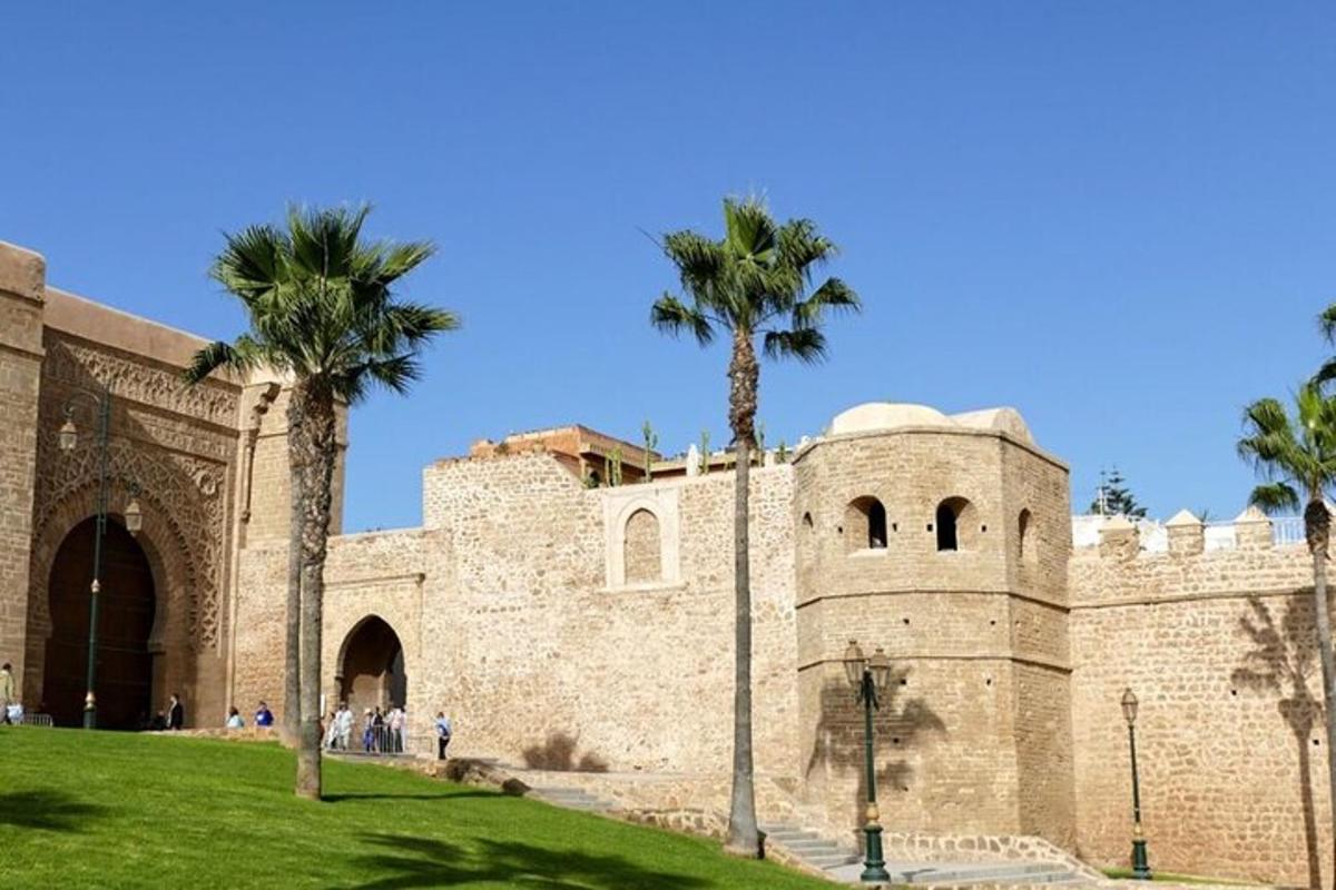 a building with palm trees in front of it