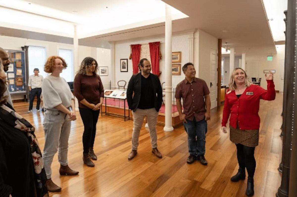 a group of people standing in a room