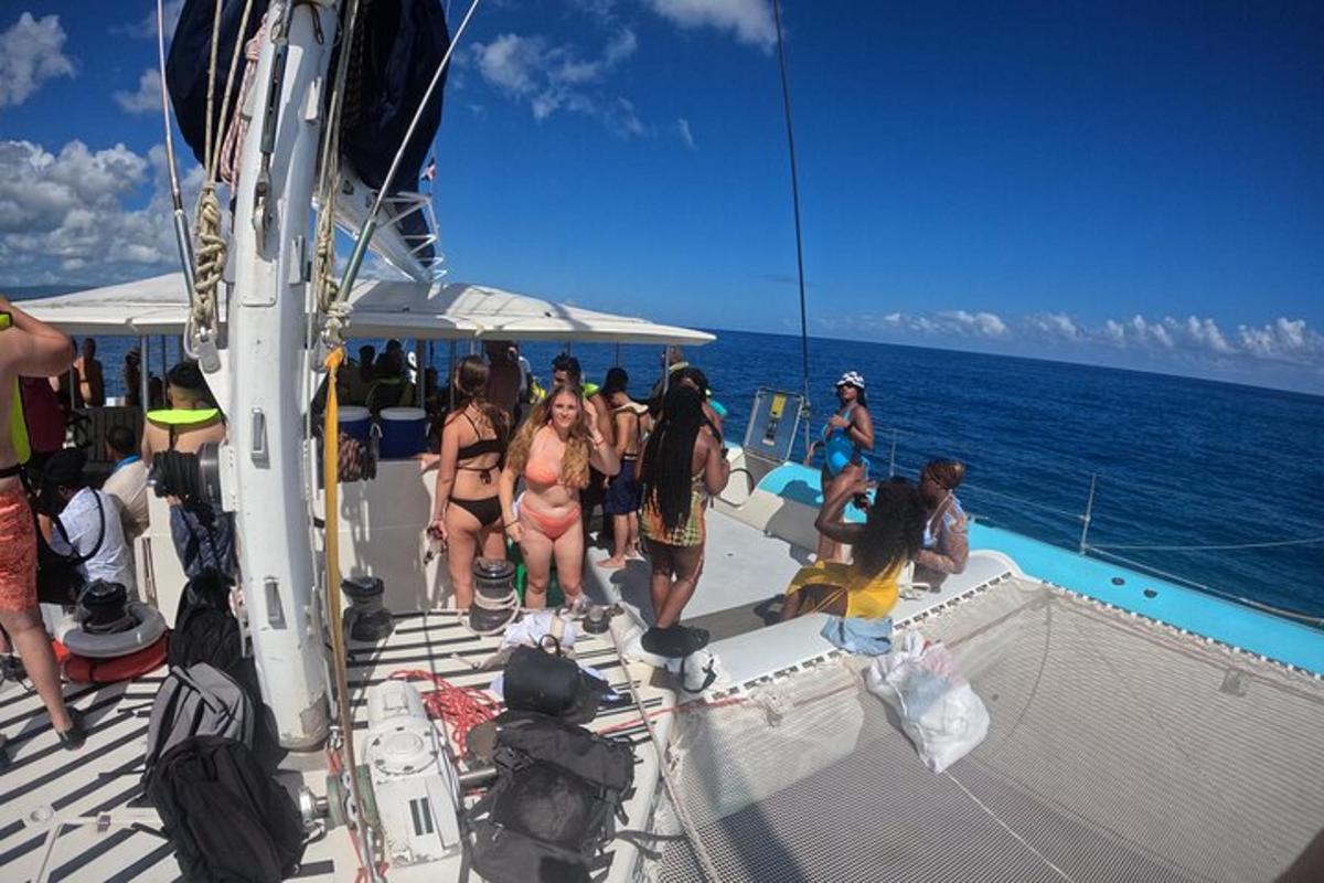 a group of people on a boat in the ocean