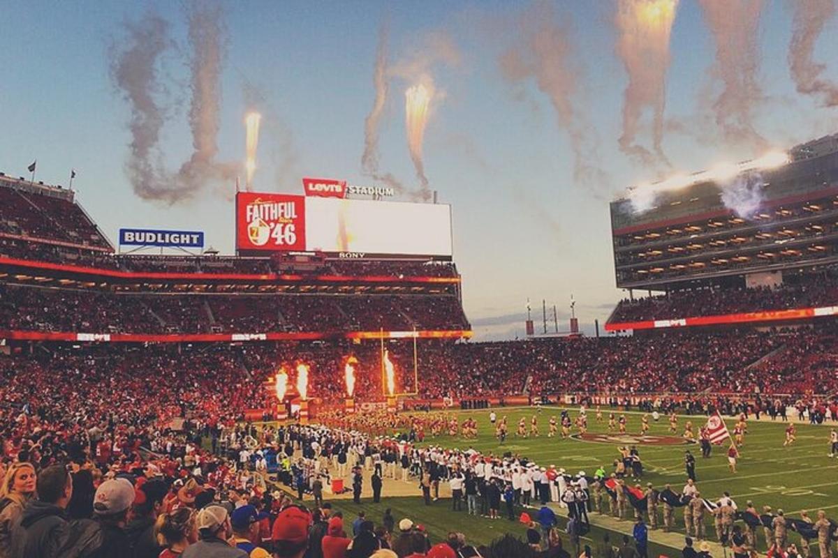 a crowd of people at a football game
