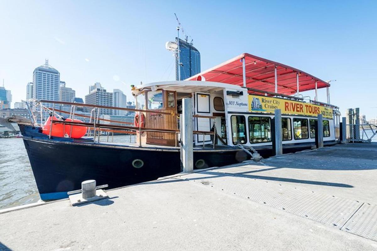 a ferry boat is docked at a dock
