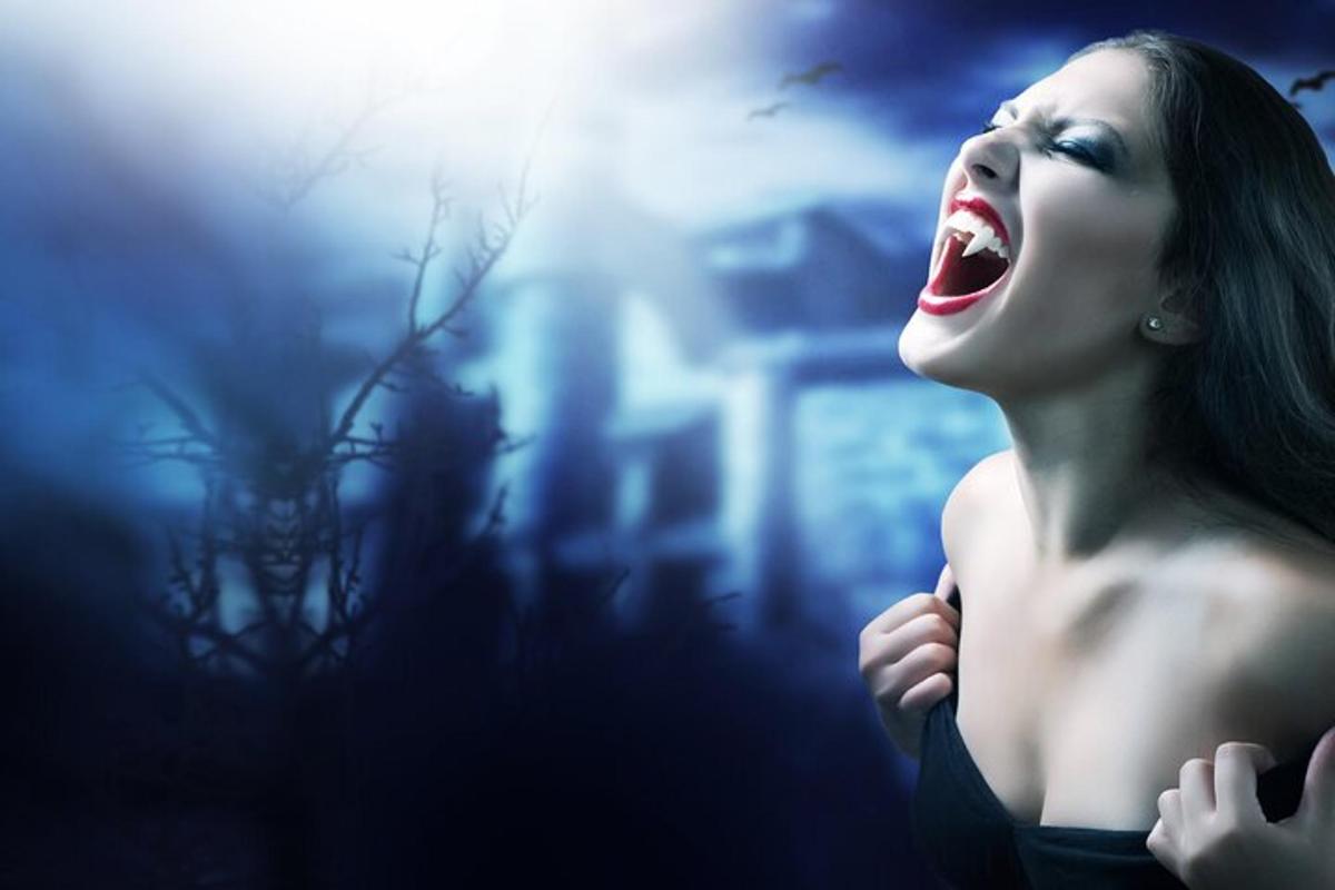 a woman is laughing with her mouth open