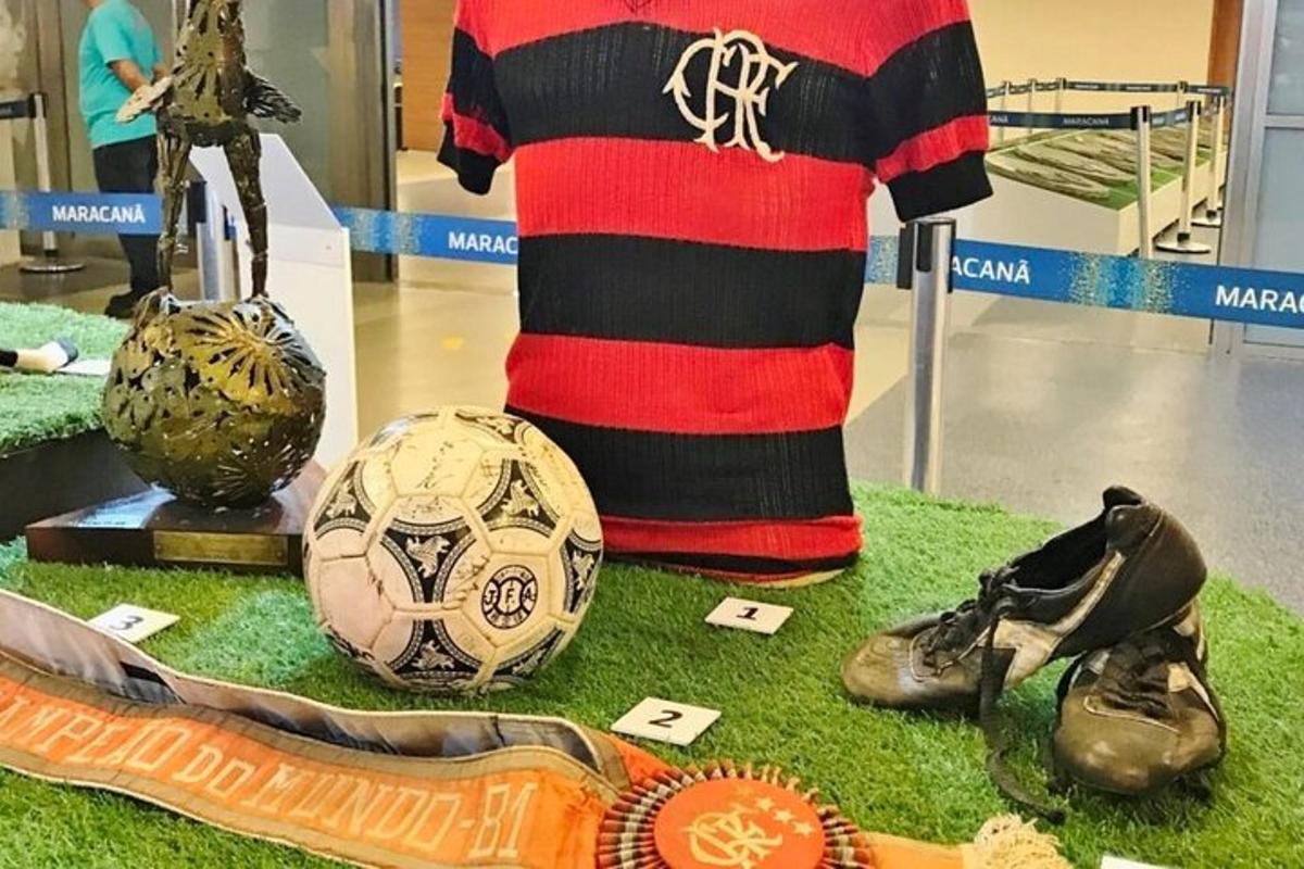 a display of a soccer ball and shoes in a store