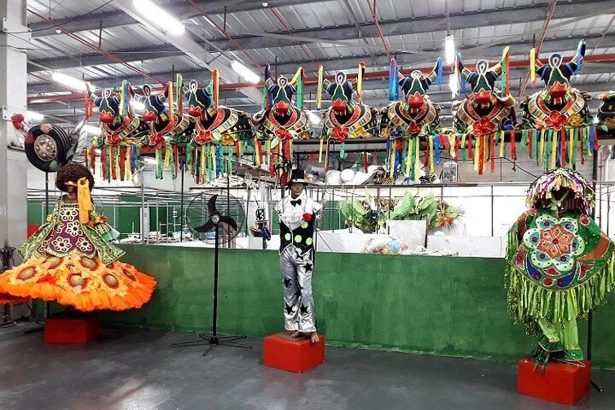 a room with two mannequins and other items on display