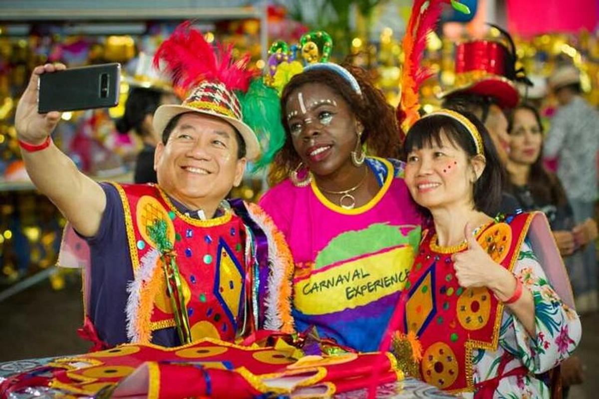 a group of people dressed in costumes posing for a picture