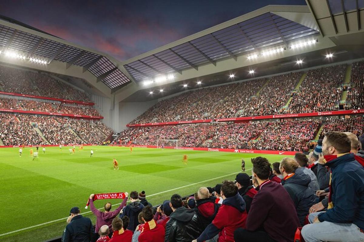 uma multidão de pessoas assistindo a um jogo de futebol em um estádio