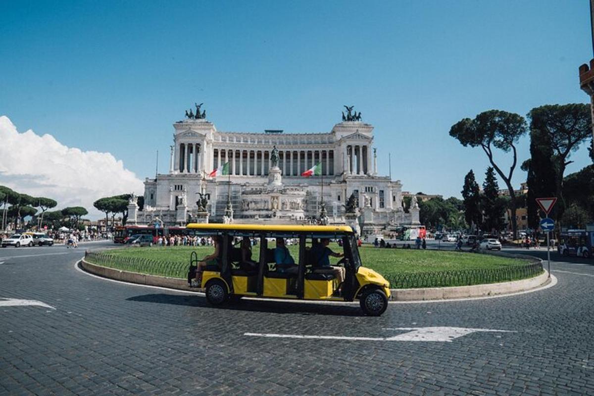 a yellow golf cart driving in front of a building