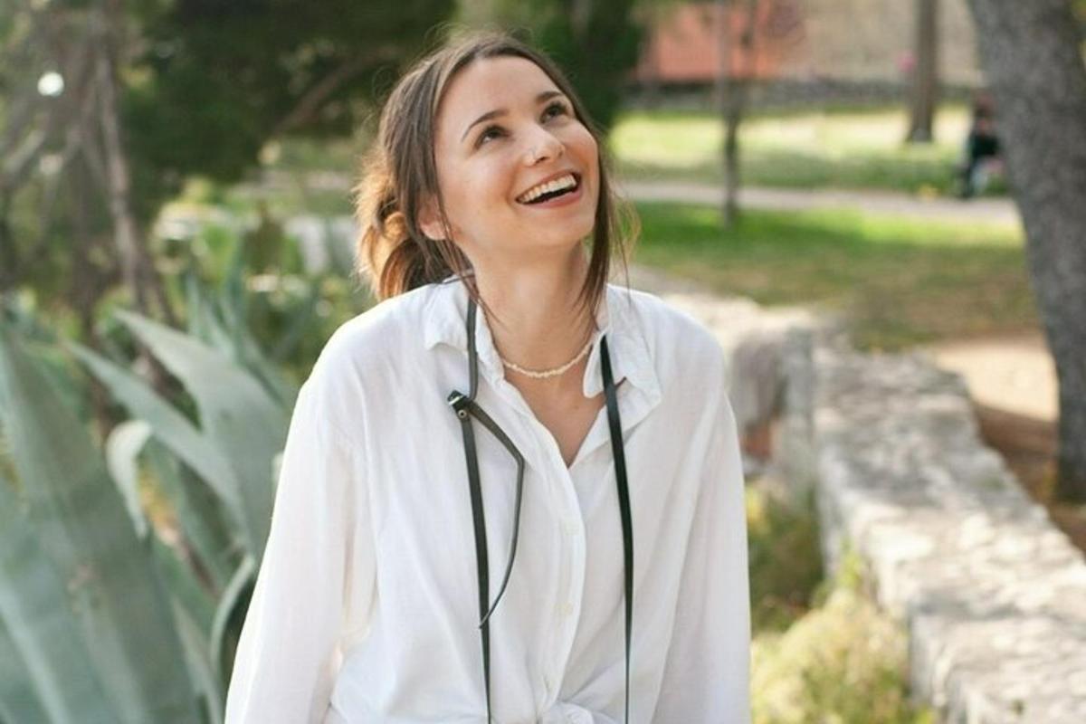 a woman with a stethoscope around her neck