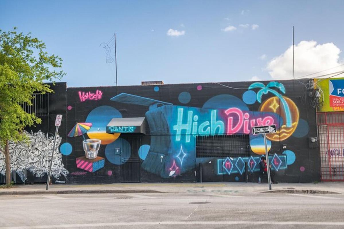 a building with a wall covered in graffiti